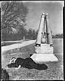 [Peter Sekaer Wrapped in Dark Cloth Lying on Ground Next to Battlefield Monument, Vicksburg, Mississippi], Walker Evans  American, Film negative