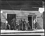 [Group of Men Seated and Standing on Sidewalk In Front of New Deal and Savoy Barber Shops, Vicksburg, Mississippi], Walker Evans (American, St. Louis, Missouri 1903–1975 New Haven, Connecticut), Film negative