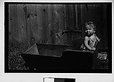 [Anita Skolle, Child of Hanns and Lily Skolle, Standing in Wooden Trough], Walker Evans  American, Film negative