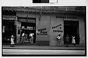 [Street Scene in Front of Lottery Ticket Shop "La Casa Pepe" and Fruit Market "La Casa Rafael", Havana], Walker Evans  American, Film negative