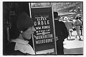 [Two 35mm Film Frames: Woman in Front of Movie Poster for 