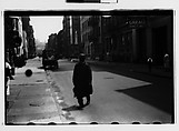 [Two 35mm Film Frames: Man Crossing Street, Possibly Abdingdon Square, and Vendor, Greenwich Village, New York City], Walker Evans (American, St. Louis, Missouri 1903–1975 New Haven, Connecticut), Film negative