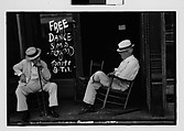[Three 35mm Film Frames: Two Elderly Men in Conversation on Porch in Front of Painted Sign for "Free Dance", Greensboro, Alabama?], Walker Evans (American, St. Louis, Missouri 1903–1975 New Haven, Connecticut), Film negative