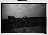 [Wooden House in Field, From Moving Automobile, Macon, Georgia], Walker Evans  American, Film negative