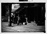 [Men Outside Corner Store, From Moving Automobile, Savannah, Georgia], Walker Evans  American, Film negative