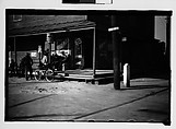 [Men Seated on Corner Store Porch, From Automobile, Savannah, Georgia], Walker Evans  American, Film negative