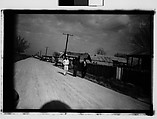 [Men Walking by Side of Road, From Moving Automobile, New Orleans Vicinity, Louisiana], Walker Evans  American, Film negative