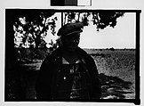 [Man Wearing Cap and Overalls Standing Next to Tree, Hale County?, Alabama], Walker Evans  American, Film negative