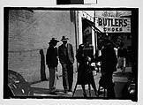 [Thirty-One 35mm Film Frames on Uncut Roll of People on Street, Including 3 of A Tintype Photographer at Work, Tallahassee, Florida], Walker Evans (American, St. Louis, Missouri 1903–1975 New Haven, Connecticut), Film negative