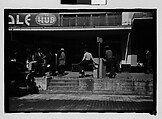 [Thirty-One 35mm Film Frames on Uncut Roll of People on Street, Including 3 of A Tintype Photographer at Work, Tallahassee, Florida], Walker Evans (American, St. Louis, Missouri 1903–1975 New Haven, Connecticut), Film negative