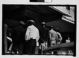 [Five 35mm Film Frames on Uncut Roll of Boy Shining Shoes on Street Corner and Men Outside Shoe Store, Tallahassee, Florida], Walker Evans (American, St. Louis, Missouri 1903–1975 New Haven, Connecticut), Film negative