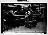 [Three 35mm Film Frames on Uncut Roll: Two Elderly Men Seated on Main Street Sidewalk Bench, Sarasota, Florida], Walker Evans (American, St. Louis, Missouri 1903–1975 New Haven, Connecticut), Film negative
