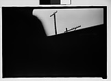 [Seven 35mm Film Frames on Uncut Roll: 5 Views of Wagons and Buildings at Ringling Brothers Circus Winter Quarters, Sarasota, Florida, 1 Study of Illustrated Bank Calendar for November 1941, and 1 Test Frame Inside Automobile], Walker Evans (American, St. Louis, Missouri 1903–1975 New Haven, Connecticut), Film negative
