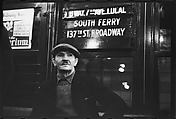 [Three 35mm Film Frames: Subway Passengers, New York City: Man in Cap Beneath 