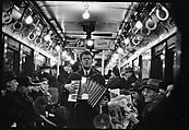 [Four 35mm Film Frames: View Down Subway Car: Accordionist Performing in Aisle, Newspaper Vendor in Aisle, New York City], Walker Evans (American, St. Louis, Missouri 1903–1975 New Haven, Connecticut), Film negative