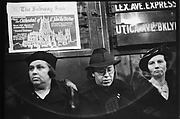 [Five 35mm Film Frames: Subway Passengers, New York City: Three Women in Hats, Women and Man Beneath 