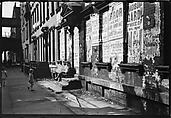 [Five 35mm Film Frames: View Down Street in Hell's Kitchen with Children on Stoop and Torn Circus Posters, New York City], Walker Evans (American, St. Louis, Missouri 1903–1975 New Haven, Connecticut), Film negative