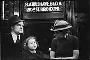 [Five 35mm Film Frames: Subway Passengers, New York City: Couple and Child Beneath 