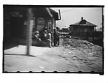 [Group of Men Outside Roadside Stand, From Moving Automobile, Louisiana], Walker Evans  American, Film negative