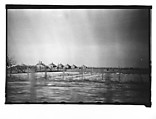 [Row of Wooden Houses in Field, From Moving Automobile, Louisiana], Walker Evans  American, Film negative