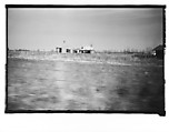 [Wooden House and Adjacent Farm Building in Field, From Moving Automobile, Louisiana], Walker Evans  American, Film negative