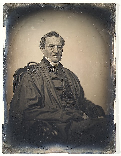 [Man in Judge's Robes; Seated]