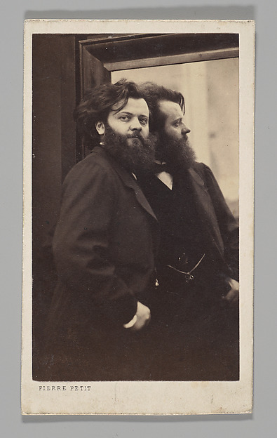 [Studio Portrait: Self-Portrait Standing by a Mirror]