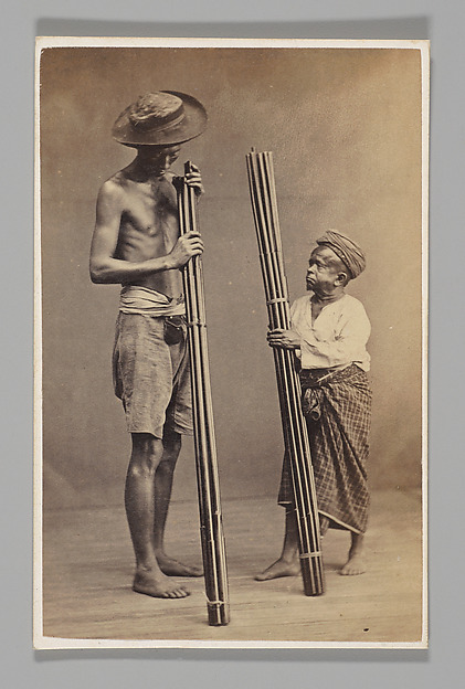 [Studio Portrait: Two Men each Holding Bamboo, Singapore]