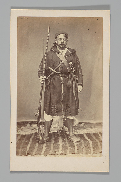 [Studio Portrait: Man with Gun, Algeria]