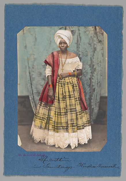 [Studio Portrait of Woman Wearing Head Scarf, Shawl, and Plaid Skirt, Brazil] by Unknown, The Metropolitan Museum of Art