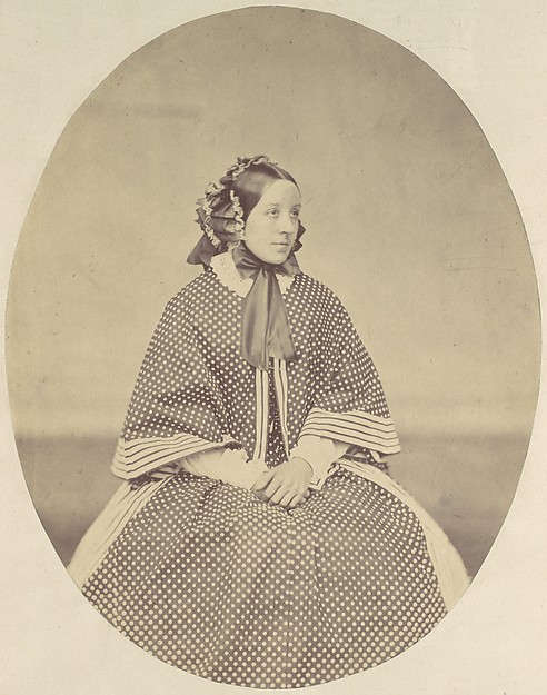 [Young Woman in Dotted Dress]