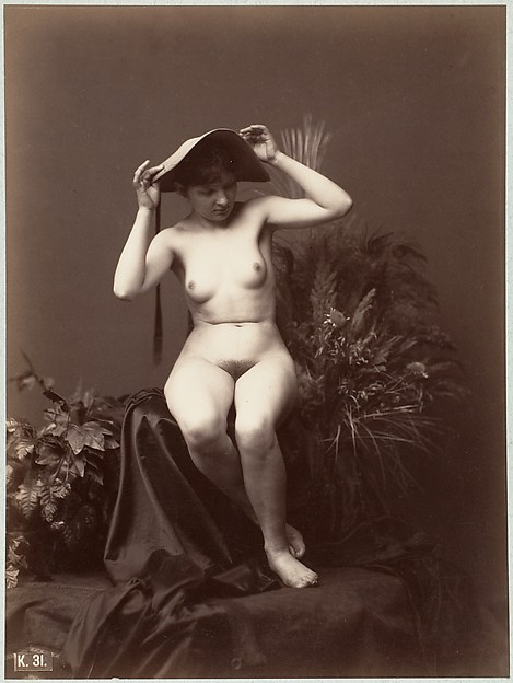 [Nude Woman with Hat in Studio]