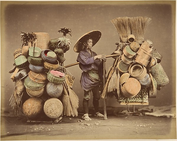 [Japanese Man Posing with Baskets, Brooms and Feather Dusters]