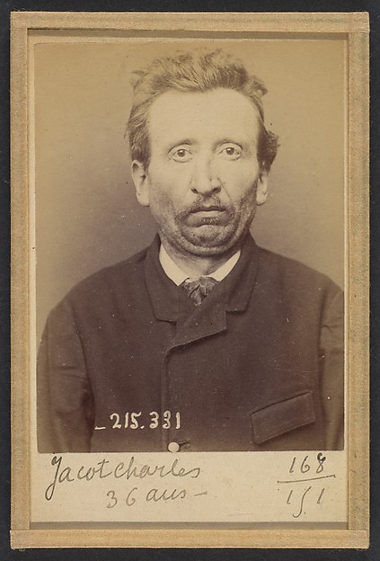 Jacot. Charles, Émile. 36 ans, né à Allenjoie (Doubs). Colporteur Anarchiste. 8/3/94.