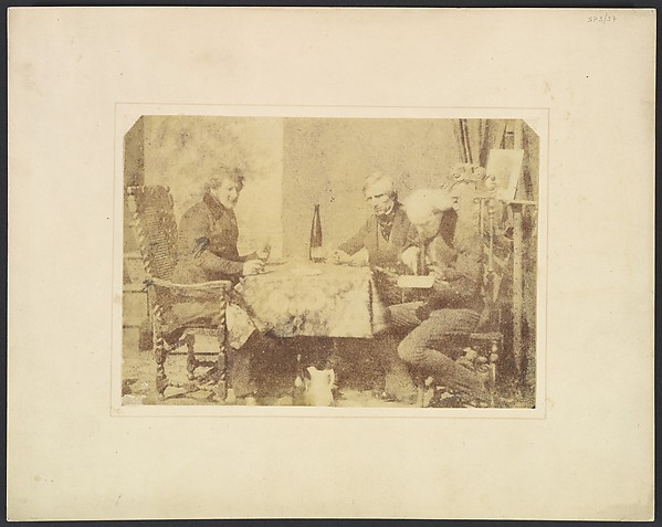 Group of Gentlemen Conversing over a Glass of Wine