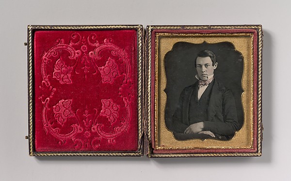 [Young Man with Up-turned Collar and Bow Tie]