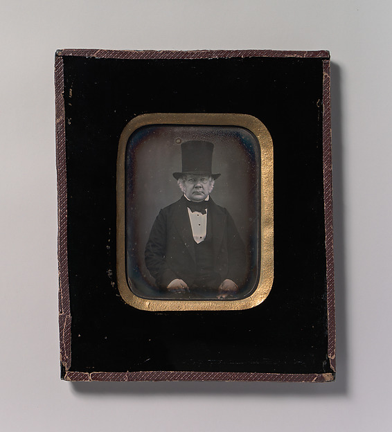 [Older Man Wearing Top Hat]