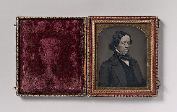 [Elderly Man with Dark Hair]