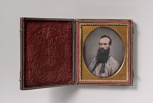 [Bearded Man in Shirtsleeves and String Tie]