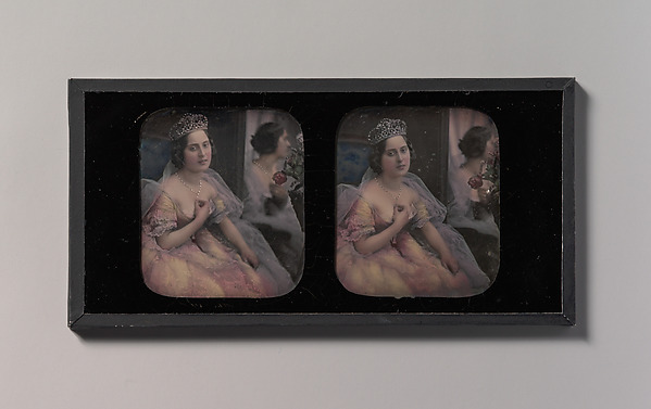 [Stereograph of a Woman Wearing a Tiara and Tulle and Lace Dress, Seated Before a Mirror]