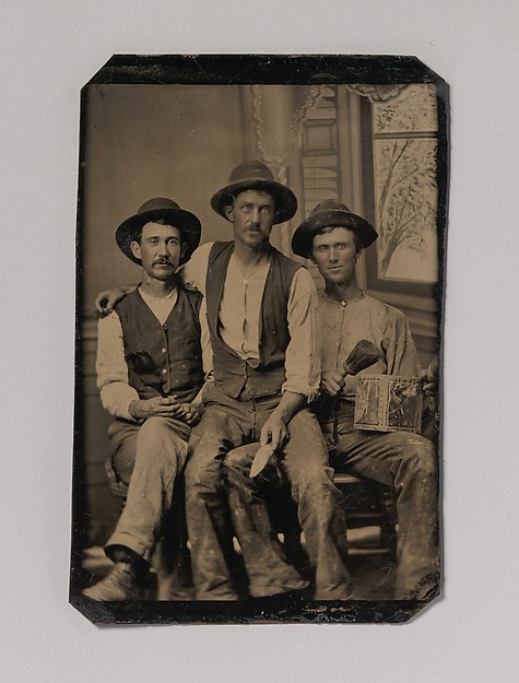 [Three Painters, with Brushes and a Can of Paint, in Front of a Painted Window Backdrop]