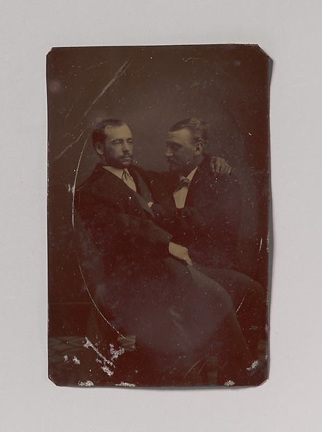 [Two Men Seated, One in the Other's Lap, with Their Hands in Suggestive Positions]