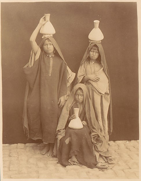 [Arab Girls Carrying Water]