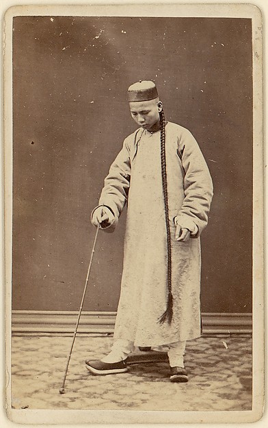 [Man with Long Braid]