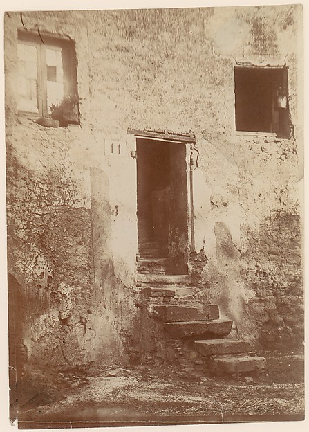 [Doorway Into Crumbling Brick Building]
