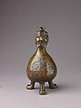 Aquamanile in the Form of a Gourd with a
Human Head, Bronze; quaternary copper alloy (62.8% copper, 18.3% lead; 11.9% zinc, 7% tin); with a thin layer of dark patina., German