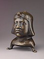 Aquamanile in the Form of a Human Head, Bronze; Ternary copper alloy with a very high percentage of zinc (approx. 68% copper,
approx. 26% zinc, approx. 4% tin), covered with a thin black lacquer patina; traces of cinnabar have been detected on the interior and exterior of the vessel., German or French, Paris (in fourteenth-century Hildesheim style)