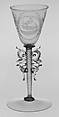 Wineglass, Colorless (slightly tan) nonlead glass. Blown, pattern molded, trailed, pincered, wheel-engraved., probably Italian (Venice)