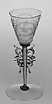 Wineglass, Colorless (slightly tan) nonlead glass. Blown, pattern molded, trailed, pincered, wheel-engraved., probably Italian (Venice)
