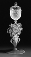 Covered goblet, Opalescent bluish white nonlead glass. Blown, pattern molded, trailed, pincered, applied parts., probably Italian (Venice)